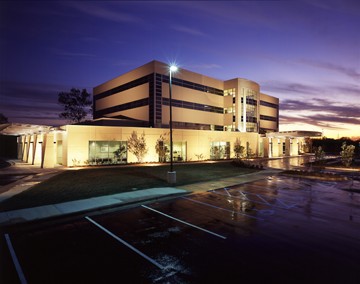 Plastic Surgical Center of Mississippi facility exterior at dusk